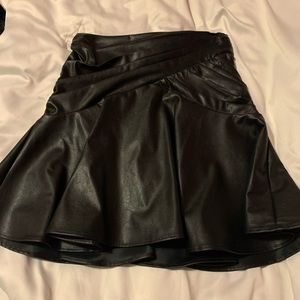 Bebe pleather circle skirt.